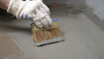 Basement waterproofing method, painting a waterproof coating on the basement floor